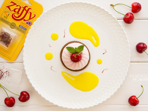 Cherry mousse on sablé cocoa biscuit with saffron sauce