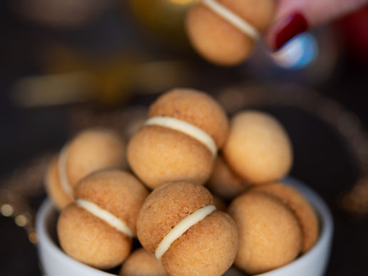 coconut baci di dama with white chocolate coconut baci di dama with white chocolate