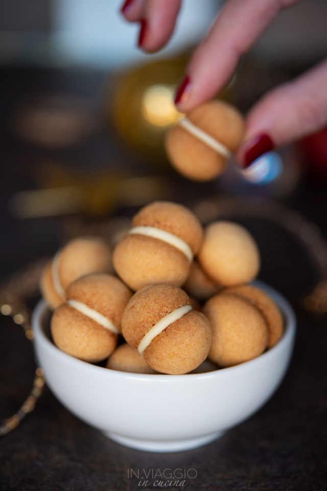 coconut baci di dama with white chocolate coconut baci di dama with white chocolate