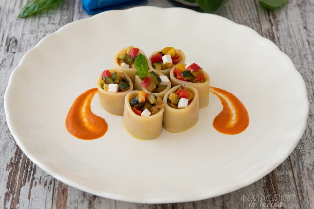Cold pasta stuffed with ratatouille with red bell pepper sauce Cold pasta stuffed with ratatouille with red bell pepper sauce