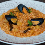 Red risotto with mussels and potatoes Red risotto with mussels and potatoes