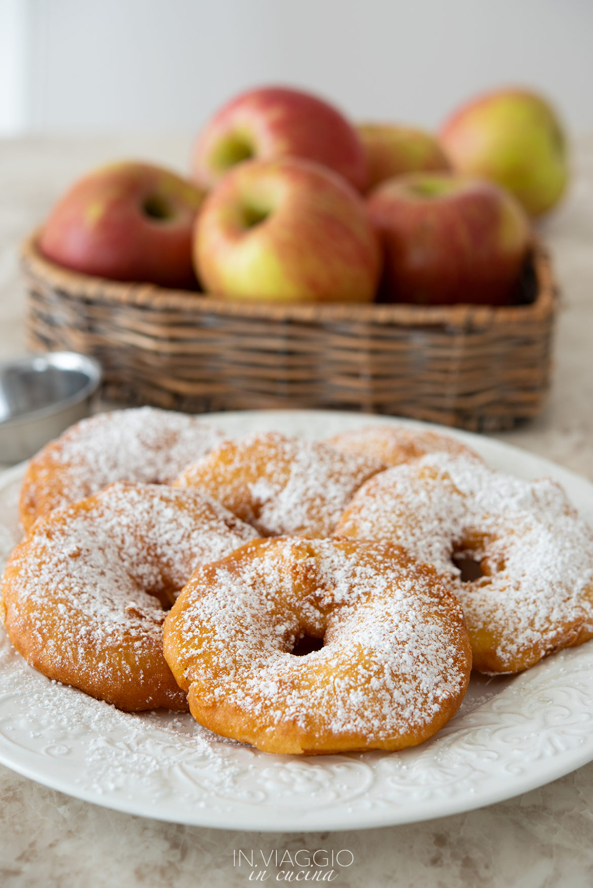 Apple fritters with icing sugar Apple fritters with icing sugar